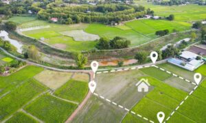 Aerial view of adjoining parcels where land surveying helps define the boundaries for a larger development site