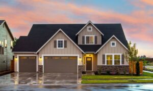 Modern suburban house with wet driveway after rainfall representing why homeowners need a flood elevation certificate