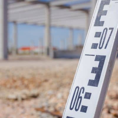 Construction grade rod elevation - ALTA SURVEY Utah Grade rod used during house staking to verify finished floor elevation before concrete