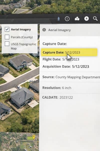 Map interface displaying aerial imagery with metadata panel highlighting the capture date used to verify when the image was taken